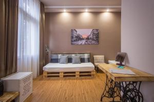 Postel nebo postele na pokoji v ubytování Hotel Carpe Diem