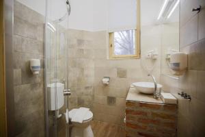 Koupelna v ubytování Hotel Carpe Diem