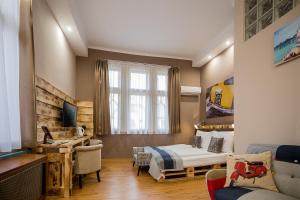 Postel nebo postele na pokoji v ubytování Hotel Carpe Diem