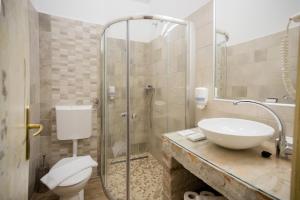 Koupelna v ubytování Hotel Carpe Diem