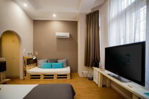 TV a/nebo společenská místnost v ubytování Hotel Carpe Diem