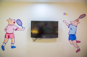 TV a/nebo společenská místnost v ubytování Legend Hotel Kaohsiung Liuhe