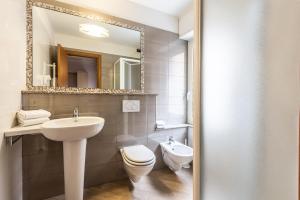 Kúpeľňa v ubytovaní Hotel Calypso