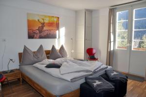 Ένα ή περισσότερα κρεβάτια σε δωμάτιο στο Chalet Trü
