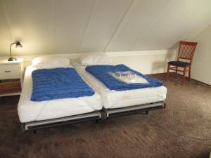 En eller flere senge i et værelse på Park Wijde Aa