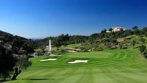 a view of a golf course with a green at Nobu Hotel Marbella in Marbella