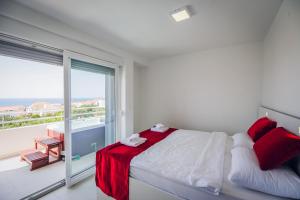 Postel nebo postele na pokoji v ubytování Residences Bellavista 2 + 37 fotografií