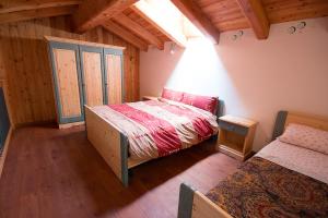 A bed or beds in a room at agriturismo la Meta