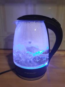 a fishtank in a glass tank with a black handle at Le Torri Apartments in Perugia
