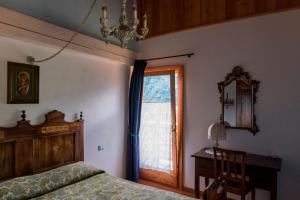 A bed or beds in a room at agriturismo la Meta