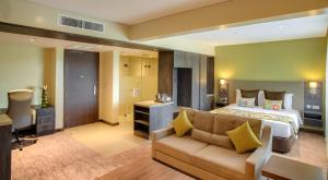 Katil atau katil-katil dalam bilik di Tamarind Tree Hotel