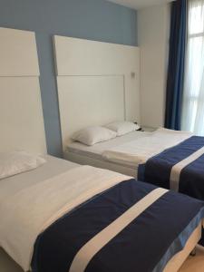 Posteľ alebo postele v izbe v ubytovaní Samsun Sahin Hotel 2