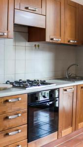 Kuchyň nebo kuchyňský kout v ubytování B&B Afrodite + 16 fotografií
