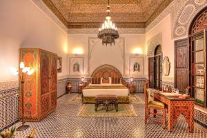 Postel nebo postele na pokoji v ubytování Riad El Amine Fès - Historic Hotels Worldwide