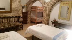 Postel nebo postele na pokoji v ubytování Apartamentos Andrada + 26 fotografií