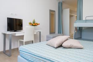 TV a/nebo společenská místnost v ubytování Eden Resort Country