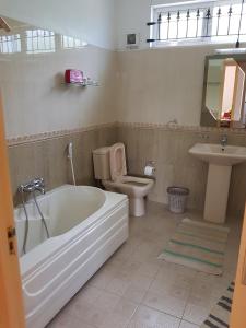 A bathroom at Suntoo Villa Wind & Kitesurf Accommodation