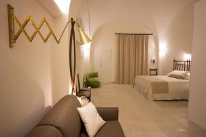 Postel nebo postele na pokoji v ubytování Ai Sottani B&B Deluxe Suite