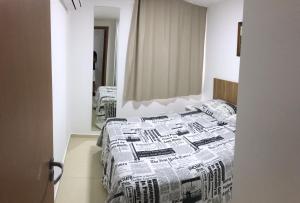 Ένα ή περισσότερα κρεβάτια σε δωμάτιο στο O melhor 2 qtos da praia de Cabo Branco +26 φωτογραφίες