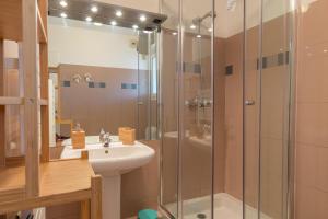 a bathroom with a sink and a shower at Monte Carlo Terrace Monaco in Beausoleil +37 photos