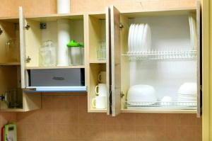 Kuchyň nebo kuchyňský kout v ubytování MAFA Apartaments + 37 fotografií