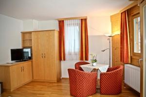 TV a/nebo společenská místnost v ubytování Hotel Druschhof