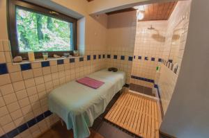 Letto o letti in una camera di Hotel Vyhlídka