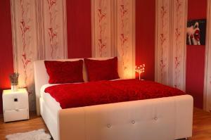 Ein Bett oder Betten in einem Zimmer der Unterkunft Ferienwohnung Schlossblick Altenburg