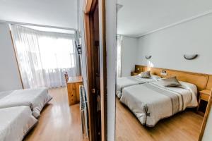 Postel nebo postele na pokoji v ubytování Alvi