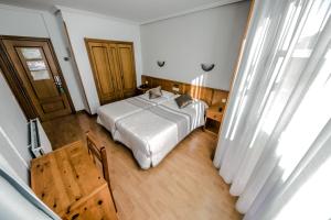 Postel nebo postele na pokoji v ubytování Alvi