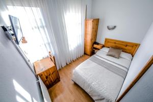 Postel nebo postele na pokoji v ubytování Alvi