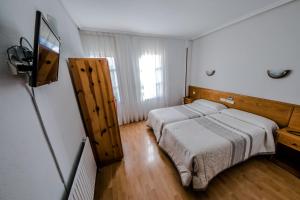 Postel nebo postele na pokoji v ubytování Alvi