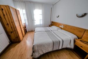 Postel nebo postele na pokoji v ubytování Alvi