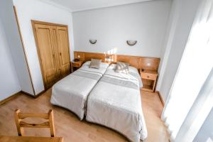 Postel nebo postele na pokoji v ubytování Alvi