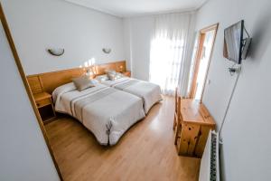 Postel nebo postele na pokoji v ubytování Alvi