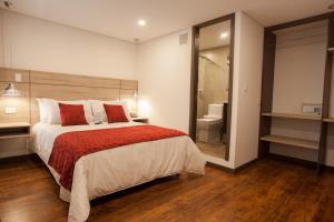 Hotel Plaza Carnaval客房内的一张或多张床位