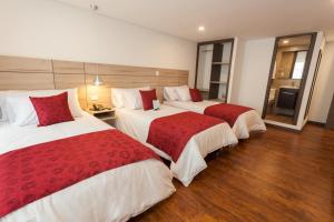 Hotel Plaza Carnaval客房内的一张或多张床位