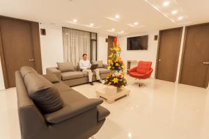 Hotel Plaza Carnaval的休息区