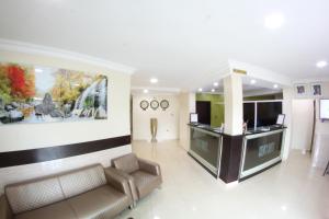 a lobby of a hospital with a waiting room at Celia's Suites in Abeokuta