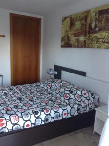 Posteľ alebo postele v izbe v ubytovaní Apartamento Edificio Diamant