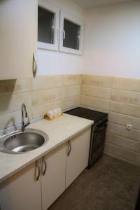 Dapur atau dapur kecil di Comfort Inn Apartment