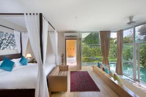 Postel nebo postele na pokoji v ubytování Ambong Pool Villas - Private Pool