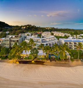 an aerial view of a resort on the beach at On The Beach Noosa Resort in Noosa Heads