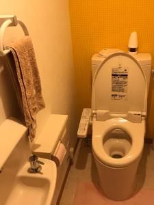 Koupelna v ubytování Guesthouse Kumano
