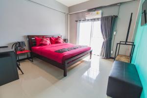 Giường trong phòng chung tại Chez Pom