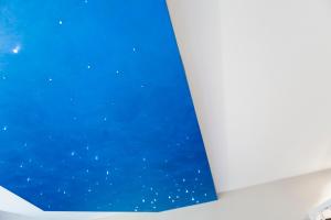a view of the night sky from a window at Hotel Villa d'Elsa in Juan-les-Pins