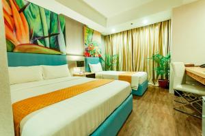 Postel nebo postele na pokoji v ubytování Aziza Paradise Hotel