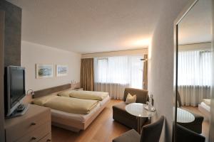 TV a/nebo společenská místnost v ubytování Hotel Belmont