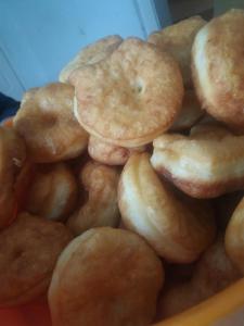 a pile of fried donuts in a bowl at Apartmani panorama in Žabljak
