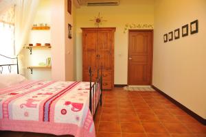 Postel nebo postele na pokoji v ubytování Tuscany Garden B&B